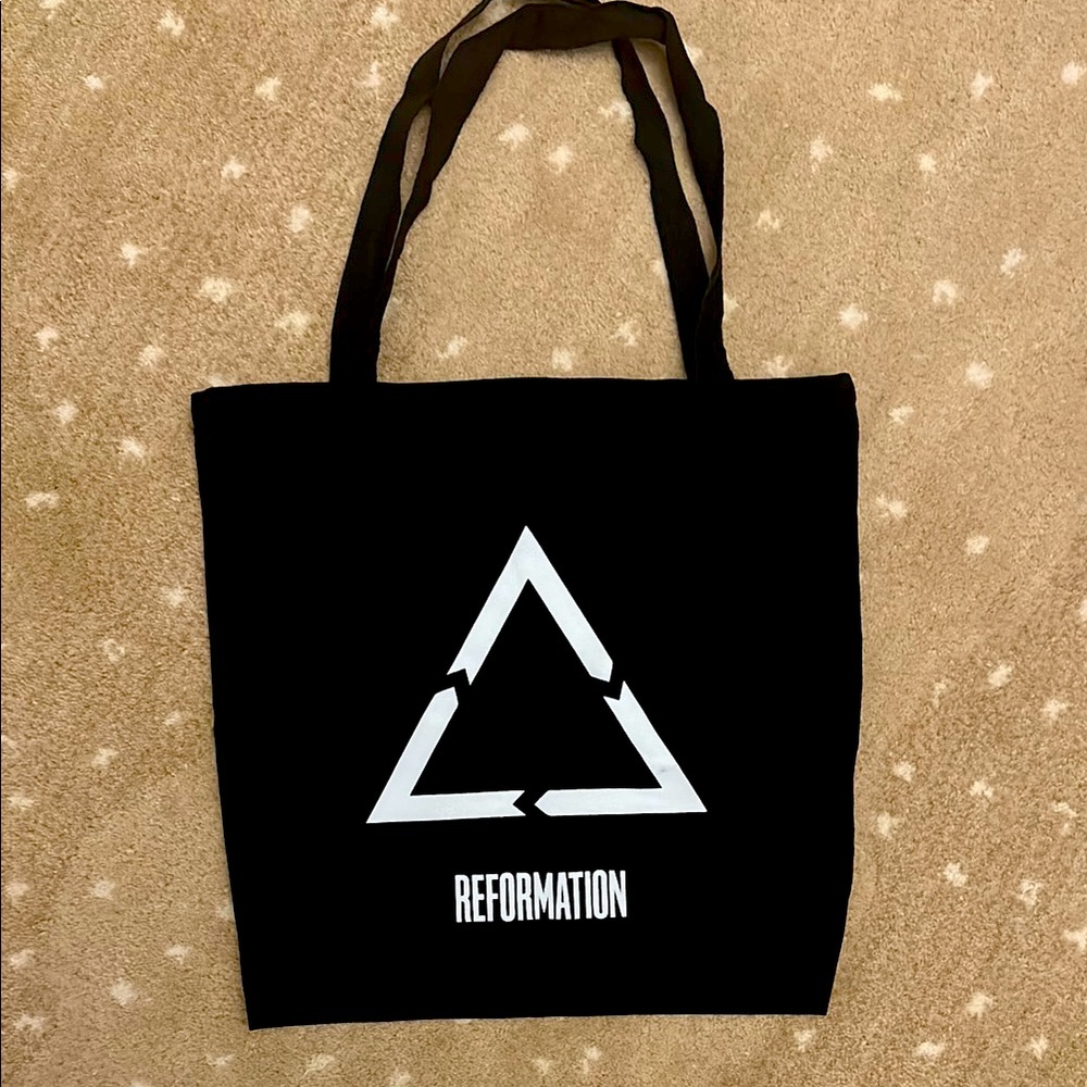 Small Reformation Black Tote with White Triangle Design
